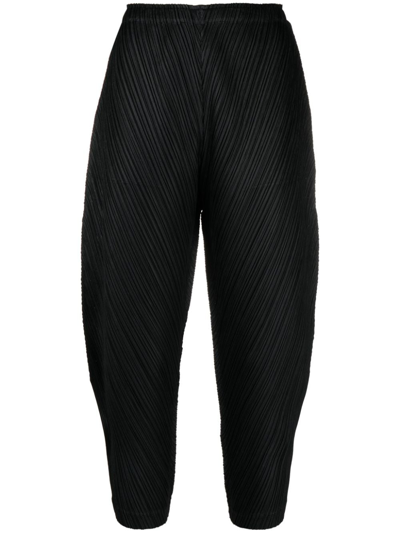 Shop Issey Miyake Plissé Cropped Trousers In Black