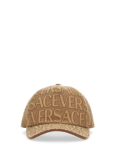 Shop Versace Baseball Cap In Beige