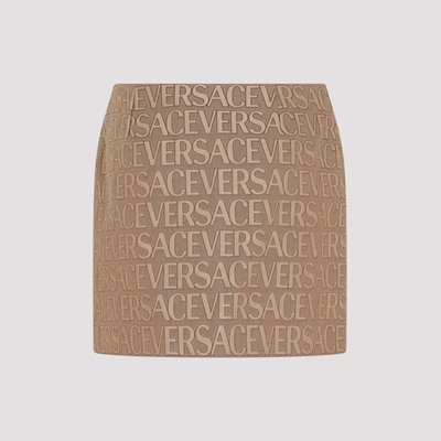 Shop Versace Canvas Logo Mini Skirt In Nude &amp; Neutrals