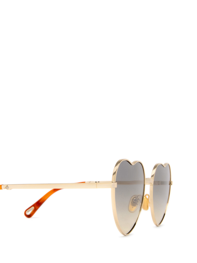 Shop Chloé Ch0071s Gold Sunglasses