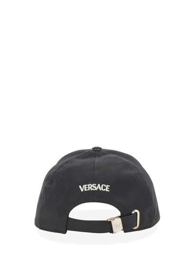 Shop Versace Baseball Cap In Nero