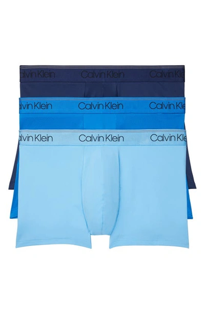 Shop Calvin Klein 3-pack Low Rise Microfiber Stretch Trunks In Blue Combo