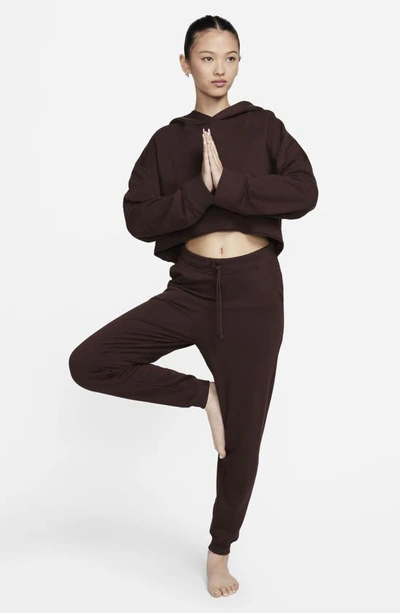 Shop Nike Yoga Luxe Fleece Crop Hoodie In Earth/ Iron Grey