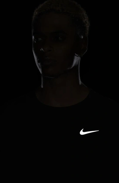 Shop Nike Dri-fit Uv Long-sleeve Running Top In Black