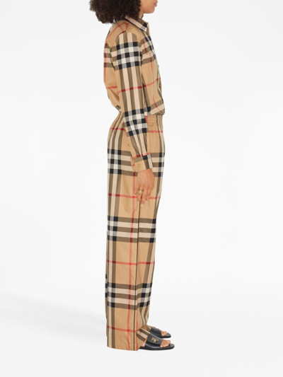 Shop Burberry Check-pattern Flared Cotton Trousers In Nude