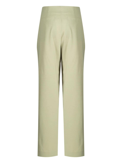 Shop Rejina Pyo Reine Pleated Tailored Trousers In Grün