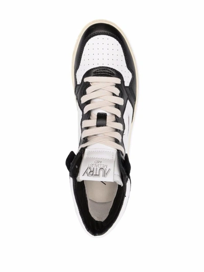 Shop Autry Medialist Mid Leather Sneakers In Black