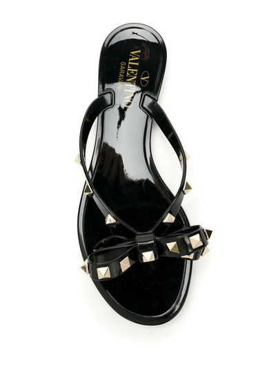 Shop Valentino Garavani Rockstud Thong Sandals In Black