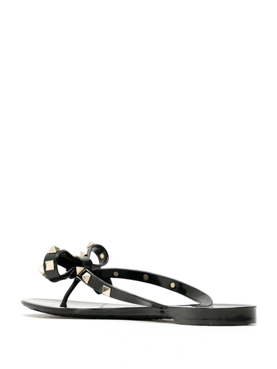 Shop Valentino Garavani Rockstud Thong Sandals In Black