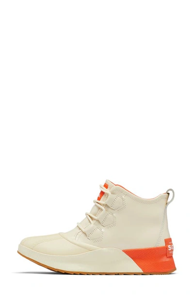 Shop Sorel Out N About Iii Waterproof Boot In Bleached Ceramic/ Orange