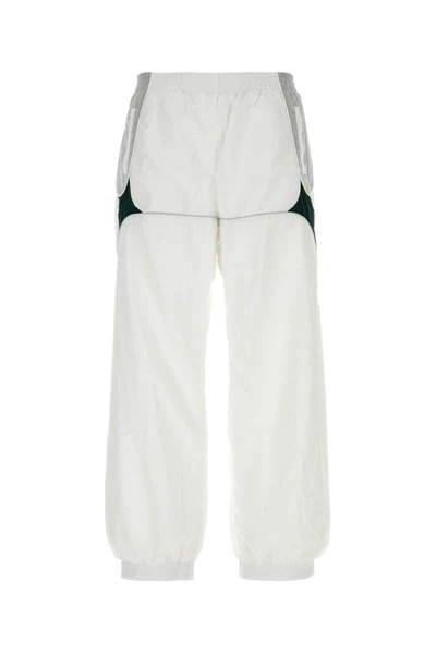 Shop Umbro Pants In White