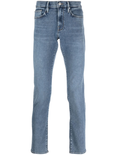 Shop Frame L'homme Slim-fit Tapered Jeans In Blue