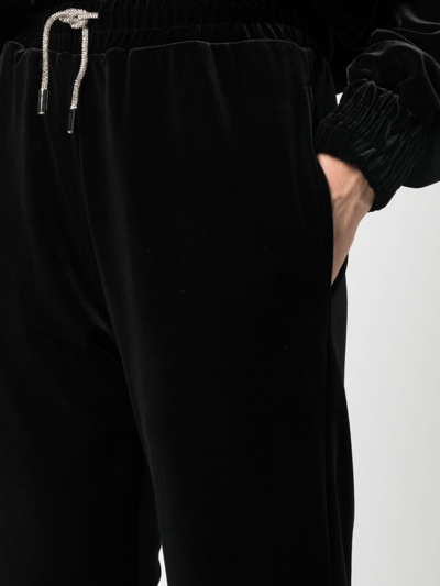 Shop Alexandre Vauthier Rhinestone-drawstring Velvet Track Pants In Black