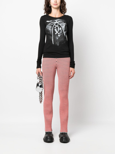 Rabanne Check-pattern Ribbed-knit Trousers In Orange