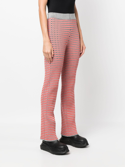 Rabanne Check-pattern Ribbed-knit Trousers In Orange