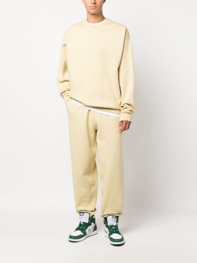 Shop Nike Solo Swish Cotton-blend Sweatshirt In Yellow