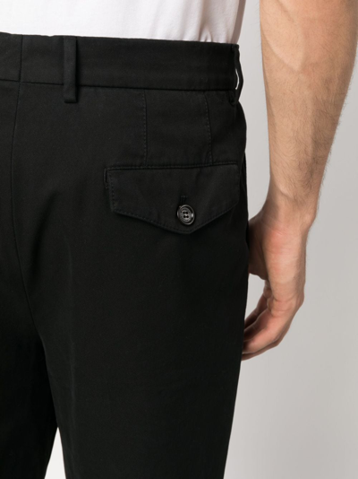Shop Brunello Cucinelli Pleat-detail Cotton Chino Trousers In Schwarz