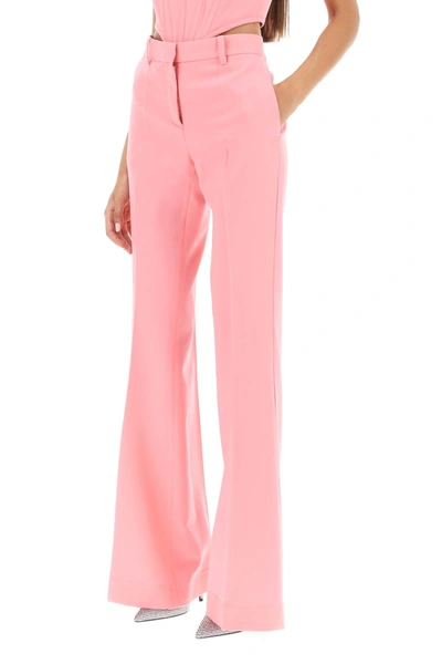 Shop Versace Low Waisted Flared Trousers