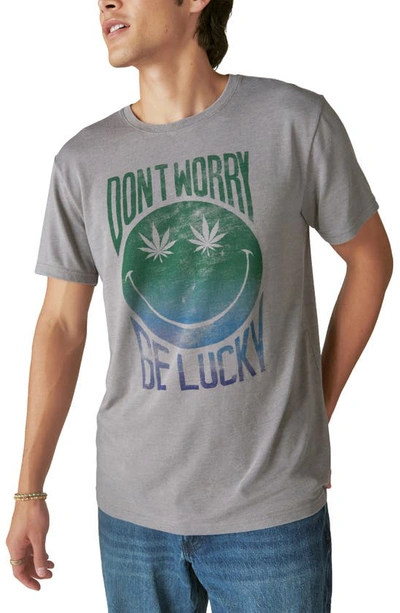 Shop Lucky Brand Don't Worry Smiley Burnout Graphic T-shirt In Frost Grey