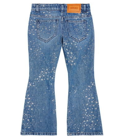 Shop Versace Printed Flared Jeans In Blue