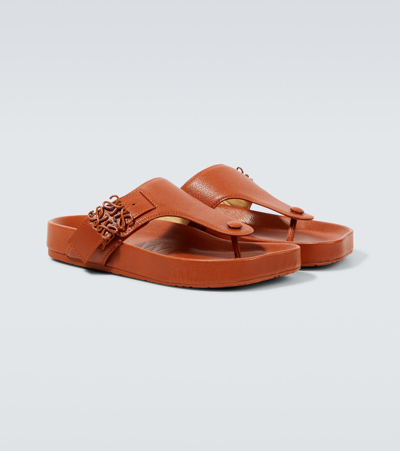 Shop Loewe Ease Anagram Leather Thong Sandals In Orange