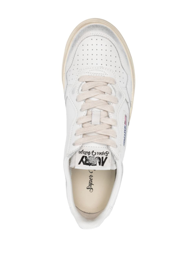 Shop Autry Medalist Distressed-effect Sneakers In White
