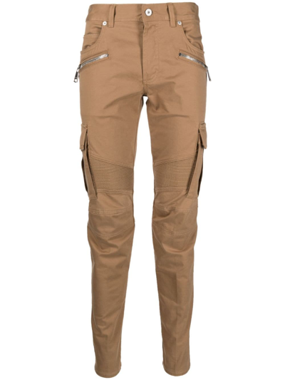 Shop Balmain Zip-detail Tapered-leg Trousers In Brown