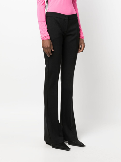 Shop Blumarine Flared Wool-blend Trousers In Black