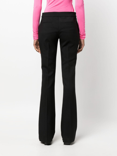 Shop Blumarine Flared Wool-blend Trousers In Black