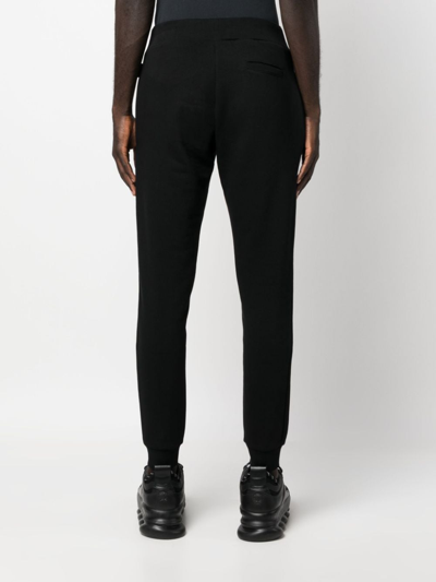 Philipp Plein Graphic-detail Tapered Track Pants In Black