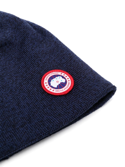 Shop Canada Goose Logo-appliqué Wool Blend Beanie In Blue