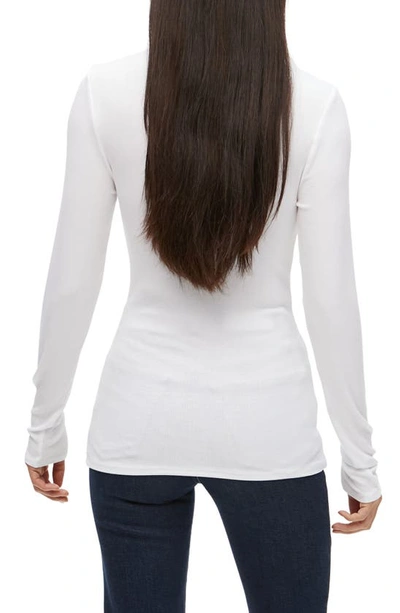 Shop Michael Stars Gail Ribbed Turtleneck Top In White