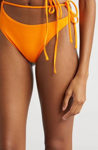 Shop K.ngsley Naomi Asymmetric Tie Waist Bikini Bottoms In Fluo Orange