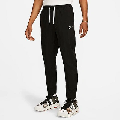 Shop Nike Men's Club Lightweight Woven Pants In Black/white