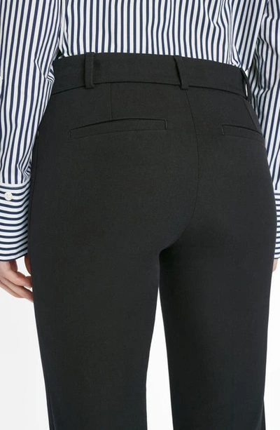 Shop Frame Le High Waist Slit Front Flare Trousers In Noir