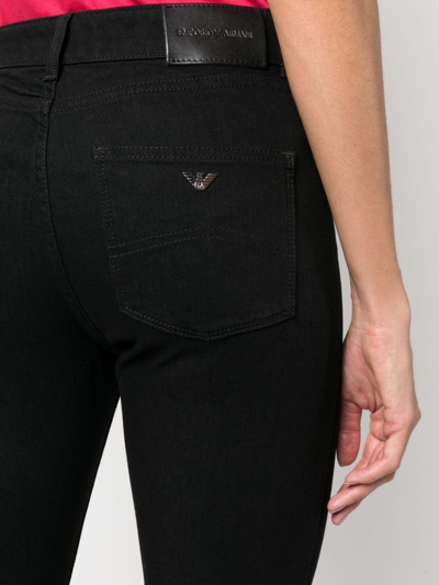 Shop Emporio Armani Mid-rise Slim-fit Jeans In Black