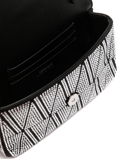 Shop Versace Virtus Crystal-embellished Leather Shoulder Bag In Black