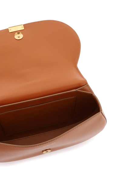 Shop Versace 'greca Goddess' Shoulder Bag In Brown
