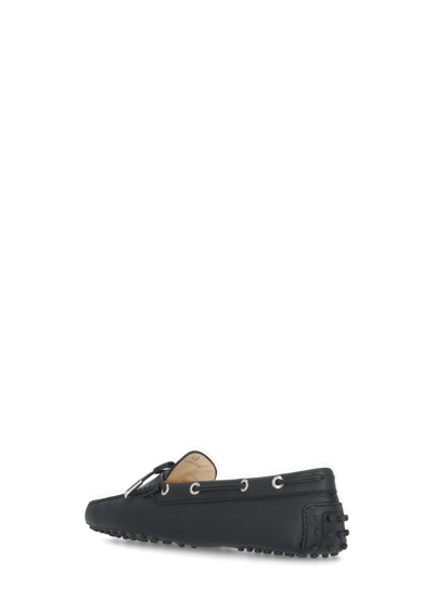 Shop Tod's Pebbled Leather Loafers In Black