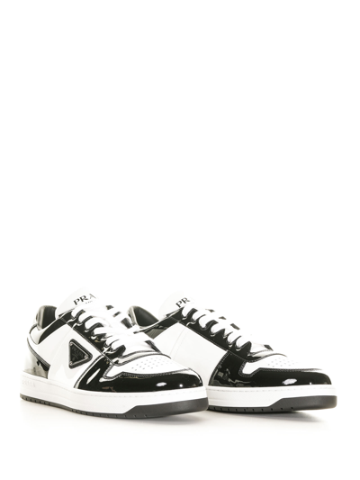 Shop Prada Downtown Sneakers In Leather In Nero+bianco