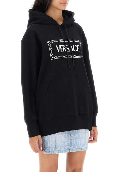 Shop Versace Hoodie With Logo Embroidery In Black