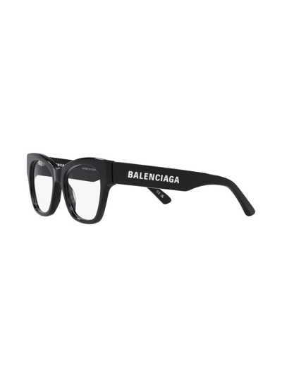 Shop Balenciaga Logo-print Cat-eye Frame Glasses In Schwarz