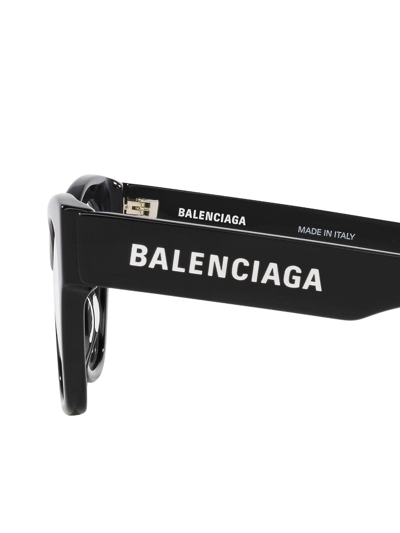 Shop Balenciaga Logo-print Cat-eye Frame Glasses In Schwarz