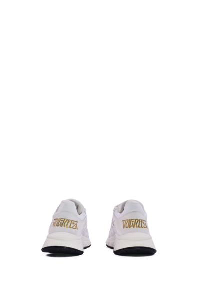 Shop Versace Trigrec Sneakers In White