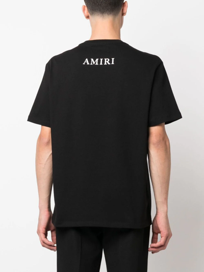 Shop Amiri T-shirt Con Stampa Logo In Black