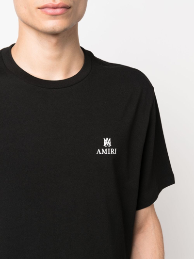 Shop Amiri T-shirt Con Stampa Logo In Black
