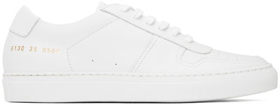 Shop Common Projects White Bball Classic Low Sneakers In 0506 White