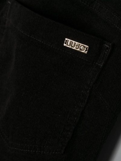 Shop Liu •jo Logo-plaque Corduroy Flared Trousers In Black