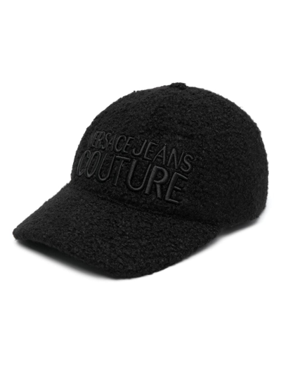 Shop Versace Jeans Couture Logo-embroidered Faux-shearling Cap In Black