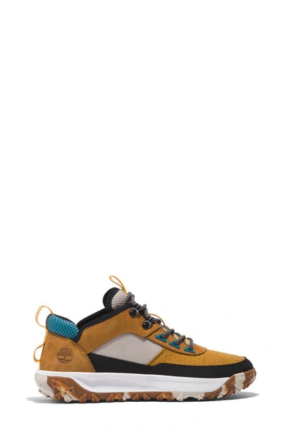 Shop Timberland Greenstride™ Motion 6 Low Water Repellent Hiking Shoe In Wheat Nubuck